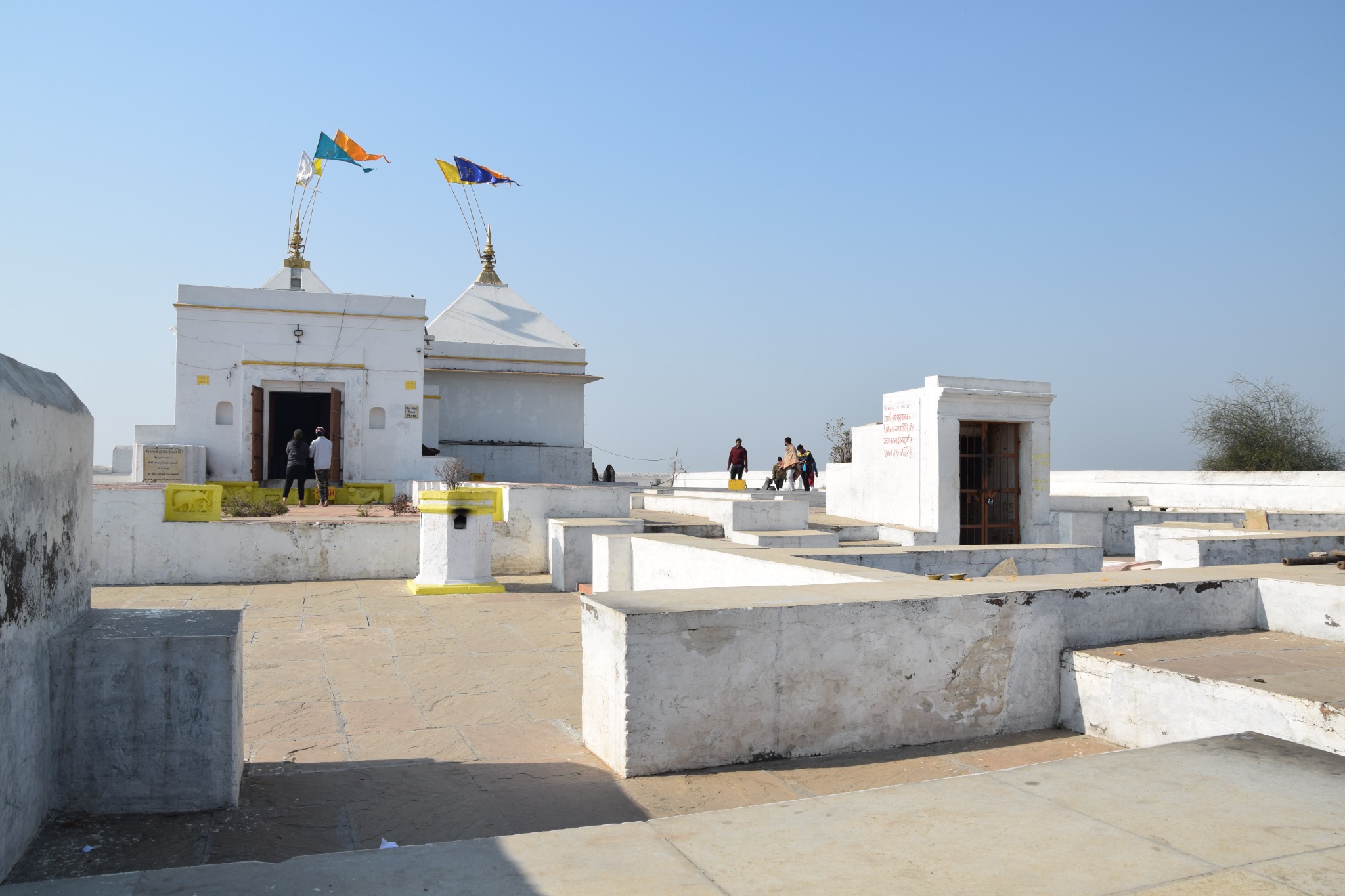 Modern shrine (c. 1870s) constructed over the original Śrī Nāthjī temple on Govardhan Hill, Jatipura, Uttar Pradesh. The shrine houses a painting (citra-jī) of Śrī Nāthjī in place of the original black marble icon, which is now enshrined in Nāthdwāra.